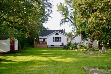 This view shows the back of the home & the large a