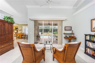 Living room-to the pool and the kitchen to the lef