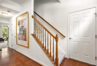 Foyer view into the living room, the door to the 7