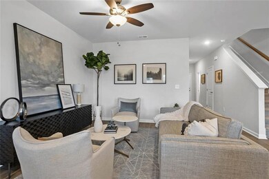 Living room featuring dark wood-type flooring and 
