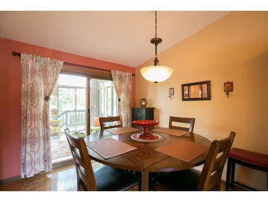 Dining area that looks out to the sunroom/backyard