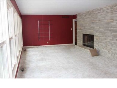 Living room with a wall of windows and incredible 