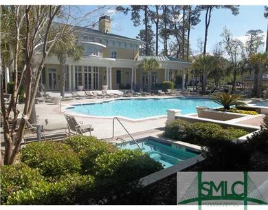 Exterior Front. Beautiful Pools and Clubhouse!