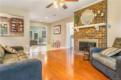 Den Opens to Kitchen and bonus room