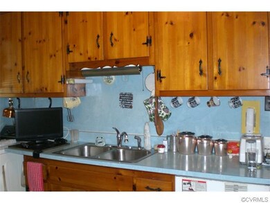 Pine Cabinets, with clothes washing machine to the