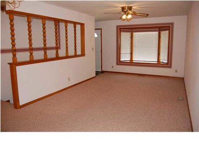 Family room with bay window.