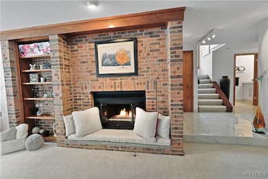 Brick fireplace w/with fire glass
