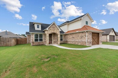 This Beautifully Designed CUSTOM Home is Nestled i
