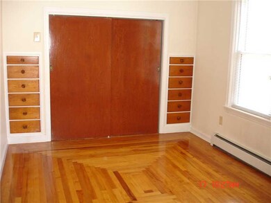 Bedroom. Front bedroom features hardwoods and buil