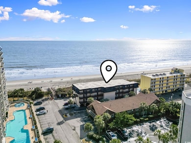 Aerial view featuring a water view and a view of t