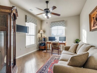 Foyer featuring crown molding and light hardwood /