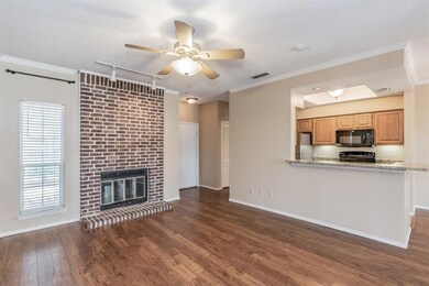 Laminate wood flooring & crown molding throughout 