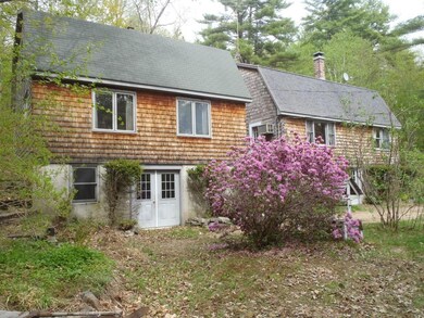 Side of house showing walkout basements.