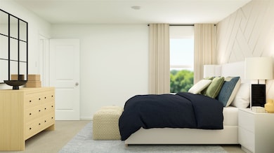 Bedroom with light colored carpet