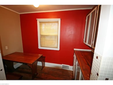 Breakfast nook off the kitchen. This could be turned into a walk in pantry.