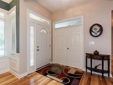Incredible Main Level boasts 10-foot ceilings, gorgeous natural hickory hardwood floors & this inviting Foyer. Your guests will feel welcome upon entering.