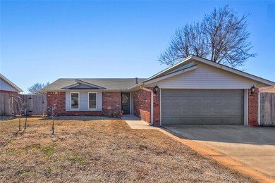 Ranch-style house featuring a garage