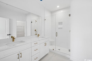 Full bathroom featuring a walk in closet, double v