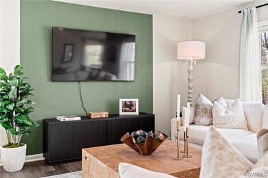Living room with dark wood-type flooring