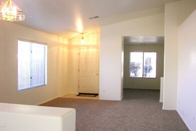 Front Entrance, Living Room & Den