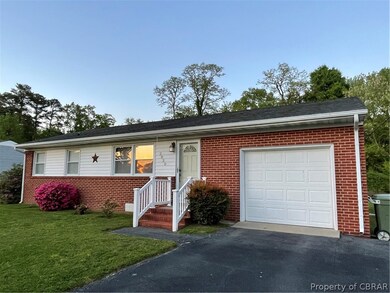 Nice Landscaping & paved double width driveway