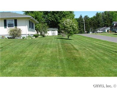 Exterior Front. Side yard.
