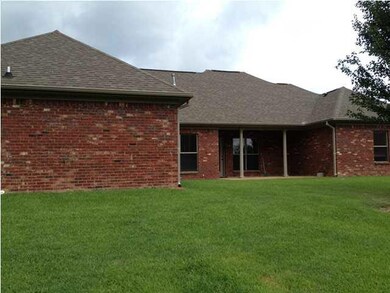 Large yard with covered patio