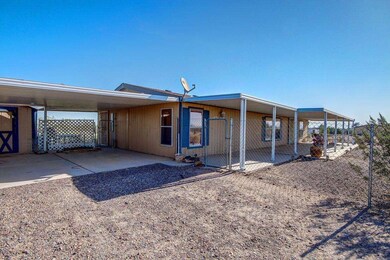 2 CARPORT AND FRONT AND BACK PATIO