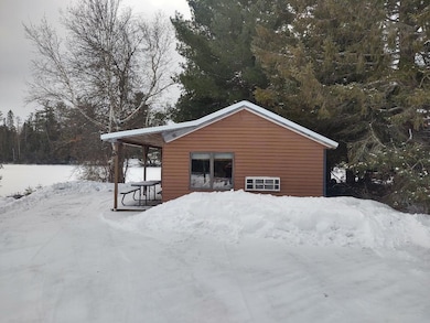 7039 River Bend Dr, Onaway, MI 49765 - photo 2