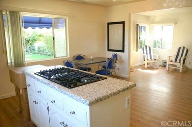 OPEN KITCHEN VIEW OF GARDEN AND EATING AREA CONNEC
