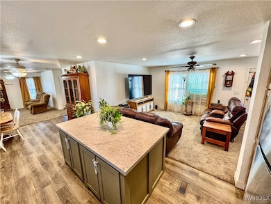 Kitchen with a healthy amount of sunlight, light w