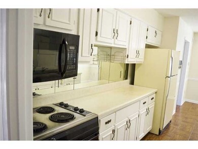 White - pristine kitchen!  Mirrored backsplash.  H