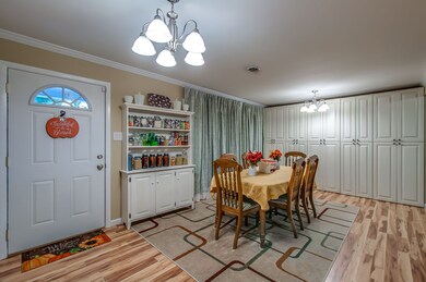 Dining room with custom built cabinets.