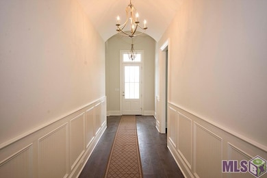 Filled with architectural style.  Beadboard wainsc