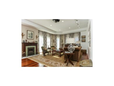 Large living room with new gas fireplace and custo
