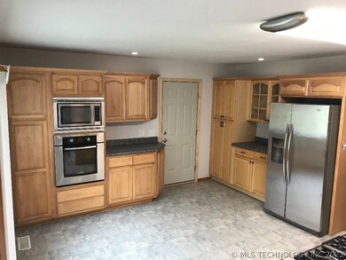 Impressive custom wood cabinetry with abundant sto