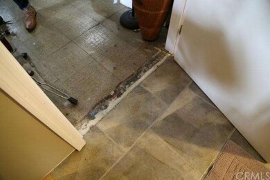 Flooring in need of repairs.