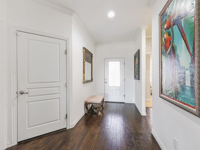 Step inside to a bright, welcoming entryway filled
