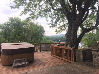 Deluxe hot tub is included with the home! This are