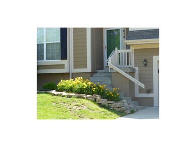 Nicely landscaped walkway and entrance