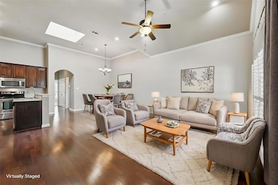 Virtually staged to showcase the space with furnit
