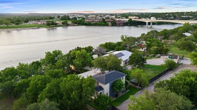 Bird's eye view of a nearby body of water and a n