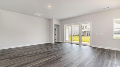 Spare room featuring hardwood / wood-style floors