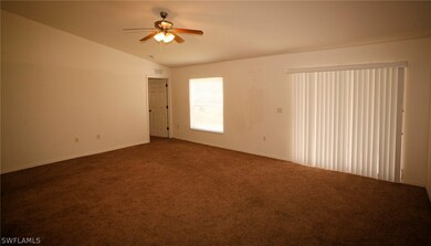 706 Oro Ave S, Lehigh Acres, FL 33974 - photo 3