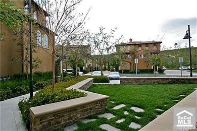 Functional pocket greenbelt outside front door.