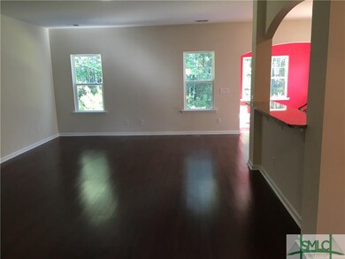 Family room with beautiful hardwood floors