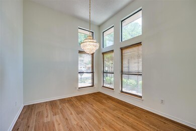 Spare room with a textured ceiling, a wealth of na