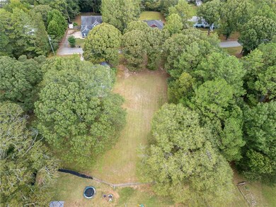 Bird's eye view with a wooded view