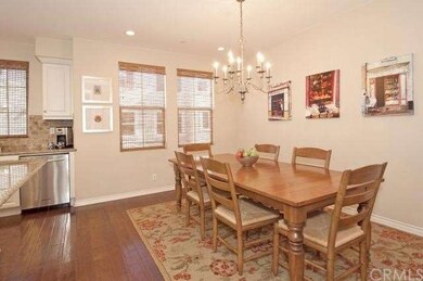 View of the kitchen, showing the walnut hardwood f