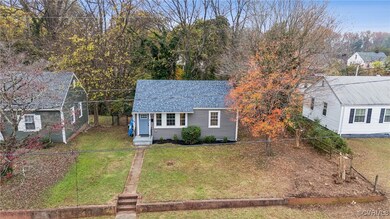 View of front of home featuring a front lawn